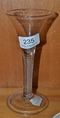 Lot 235 - An 18th century trumpet shaped wine glass with air twist stem