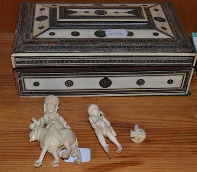 Lot 240 - A 19th century Indian ivory casket and a carved Indian figural group