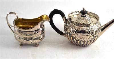 Lot 329 - Silver teapot and George III cream jug