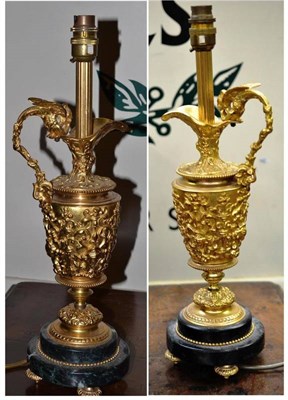 Lot 332 - A pair of gilt metal and marble Classical ewer shaped table lamps