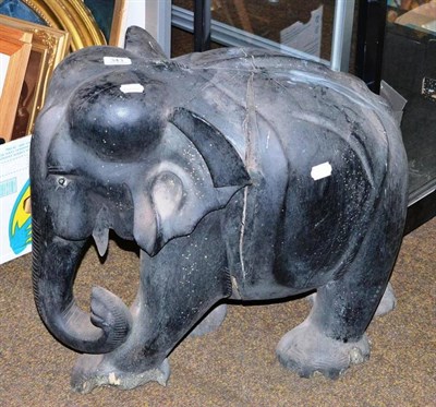 Lot 343 - A large ebony elephant