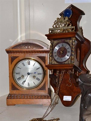 Lot 351 - A striking mantel clock retailed by Barraclough & Sons and a Dutch style wall timepiece (2)