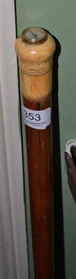 Lot 353 - A walking stick with ivory pommel set with a compass