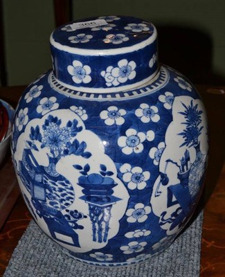 Lot 366 - A 19th century Chinese blue and white ginger jar and cover, decorated with antiques on a prunus...