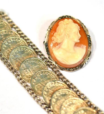 Lot 383 - A 3p piece bracelet with outer charm details and a cameo brooch stamped ";930"