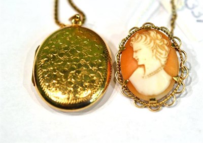 Lot 385 - A 9ct gold locket on a 9ct gold box link chain and a 9ct gold cameo brooch