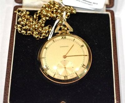 Lot 397 - A 9ct gold open faced pocket watch signed Garrard, with a chain clasp stamped 9ct in a fitted...