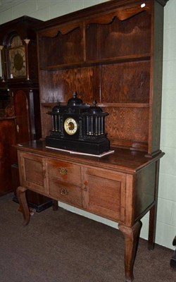 Lot 436 - An oak dresser with rack