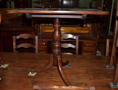 Lot 477 - A George III mahogany tripod table