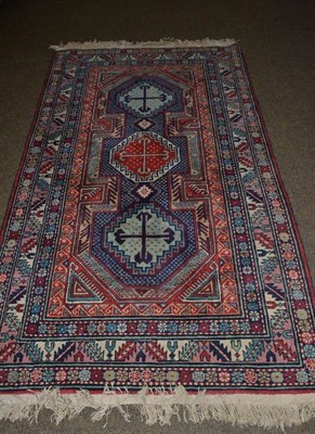 Lot 487 - A red ground Persian rug