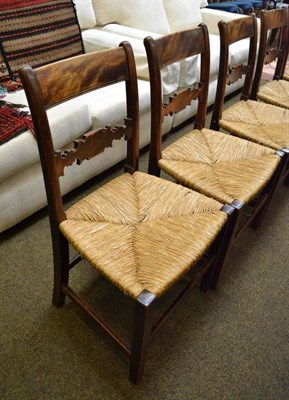 Lot 508 - Six rush seated mahogany country chairs