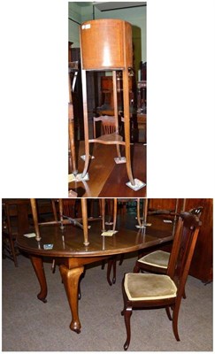 Lot 526 - A mahogany jardiniere stand, a dining table with two leaves and four inlaid mahogany chairs