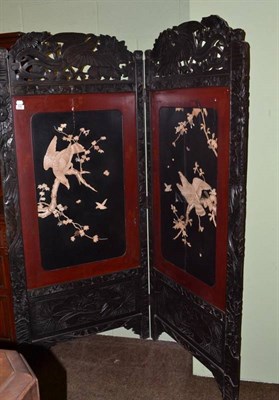 Lot 534 - A Japanese lacquer twin panel screen