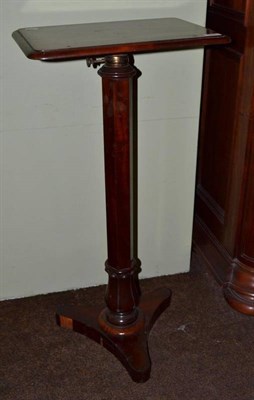 Lot 543 - A 19th century mahogany pedestal reading table