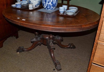 Lot 549 - A Victorian walnut loo table with cluster column and inlaid top