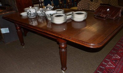 Lot 552 - Victorian mahogany wind out dining table (with two extra leaves)