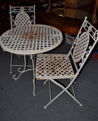 Lot 616 - A shabby chic garden table and two chairs