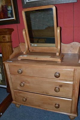 Lot 704 - A Victorian pine washstand/chest of drawers with a similar mirror