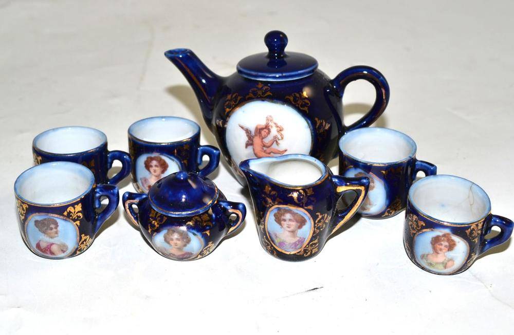 Lot 8 - A miniature doll's tea set