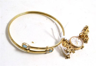 Lot 26 - A 9ct gold bangle and a 9ct gold lady's Accurist wristwatch (a.f.)