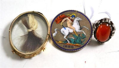 Lot 29 - Enamelled silver 1888 crown coin brooch, with a part-locket and an agate ring