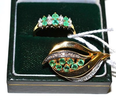 Lot 33 - An 18ct gold emerald and diamond two row ring and an emerald and diamond brooch