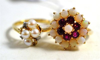 Lot 45 - A 9ct gold opal and ruby cluster ring, a 9ct gold cultured pearl and diamond ring