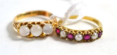 Lot 46 - A 15ct gold moonstone ring and a ruby and split pearl half hoop ring