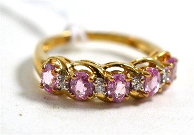 Lot 49 - A 9ct gold pink stone and diamond ring