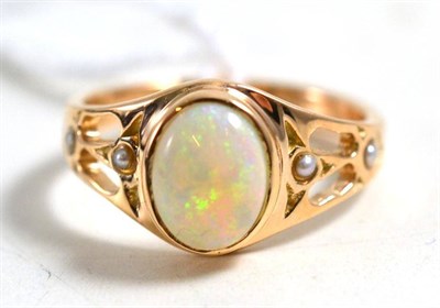 Lot 54 - An opal and seed pearl ring, stamped '585'