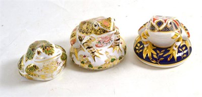 Lot 76 - Three Royal Crown Derby frogs, with boxes