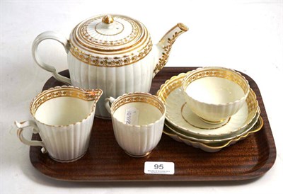 Lot 95 - A Caughley gilt part tea set, teapot, jug, tea bowl, coffee cup and three saucers