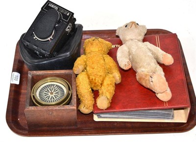 Lot 103 - Two small teddy bears, brass compass engraved Dublin, quantity of postcards and a camera