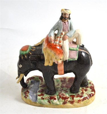 Lot 152 - A Staffordshire tiger hunt group (a.f.)