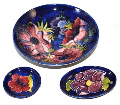 Lot 153 - Three pieces of Moorcroft; Hibiscus, Clematis and Anemone