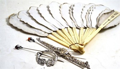 Lot 155 - Scottish pin stamped 'Silver', two Charles Horner hat pins, bone fan and a costume jewellery watch