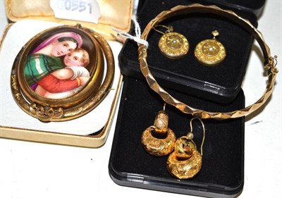 Lot 158 - A bangle stamped '375', a gold plated miniature brooch and two pairs of earrings