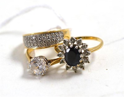 Lot 184 - A 9ct gold sapphire and diamond cluster ring, a 9ct gold pave set diamond ring and a 9ct gold cubic