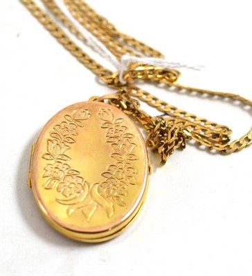 Lot 185 - A 9ct gold locket on a curb chain