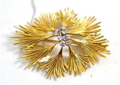 Lot 189 - An 18ct gold and diamond set brooch