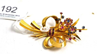 Lot 192 - 1950s ruby and sapphire floral spray clip