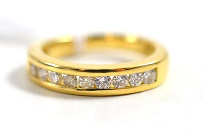 Lot 197 - A diamond half eternity ring stamped '18ct'