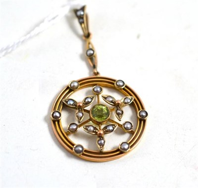 Lot 202 - A peridot and seed pearl drop pendant