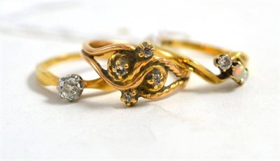 Lot 203 - An 18ct gold platinum ring, two stone diamond ring and dress ring