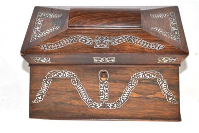 Lot 273 - A Regency rosewood sarcophagus tea caddy inlaid with mother of pearl