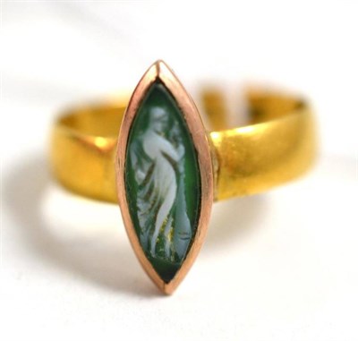 Lot 306 - A 22ct gold band ring with cameo plaque inset