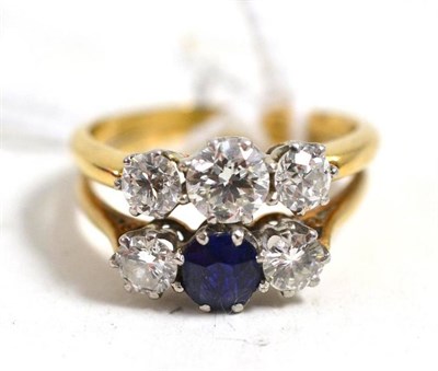 Lot 309 - A graduated diamond three stone ring joined (soldered) to a sapphire and diamond three stone ring