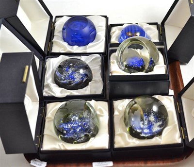 Lot 327 - Six Caithness blue glass paperweights; (1979) Mystique Edition No 131, Royal Birthday tribute...