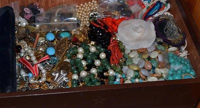 Lot 353 - Quantity of costume jewellery in a large American box, including Chanel, YSL, KJL, Ciner, etc...