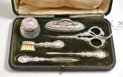 Lot 363 - A cased vanity set